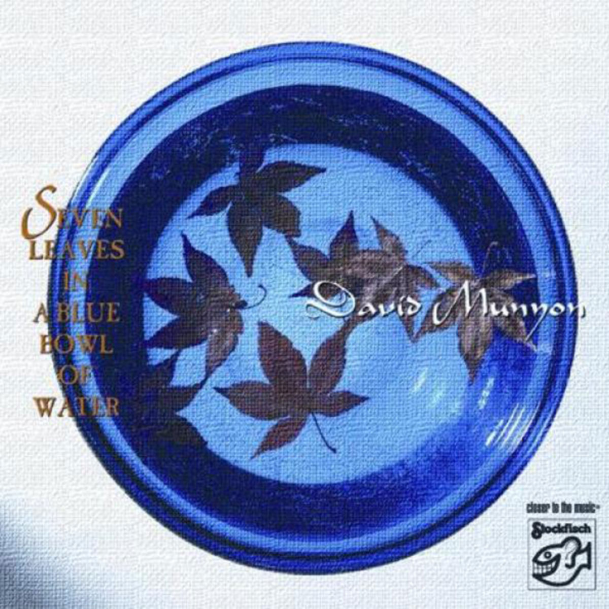Seven Leaves In A Blue Bowl Of Water